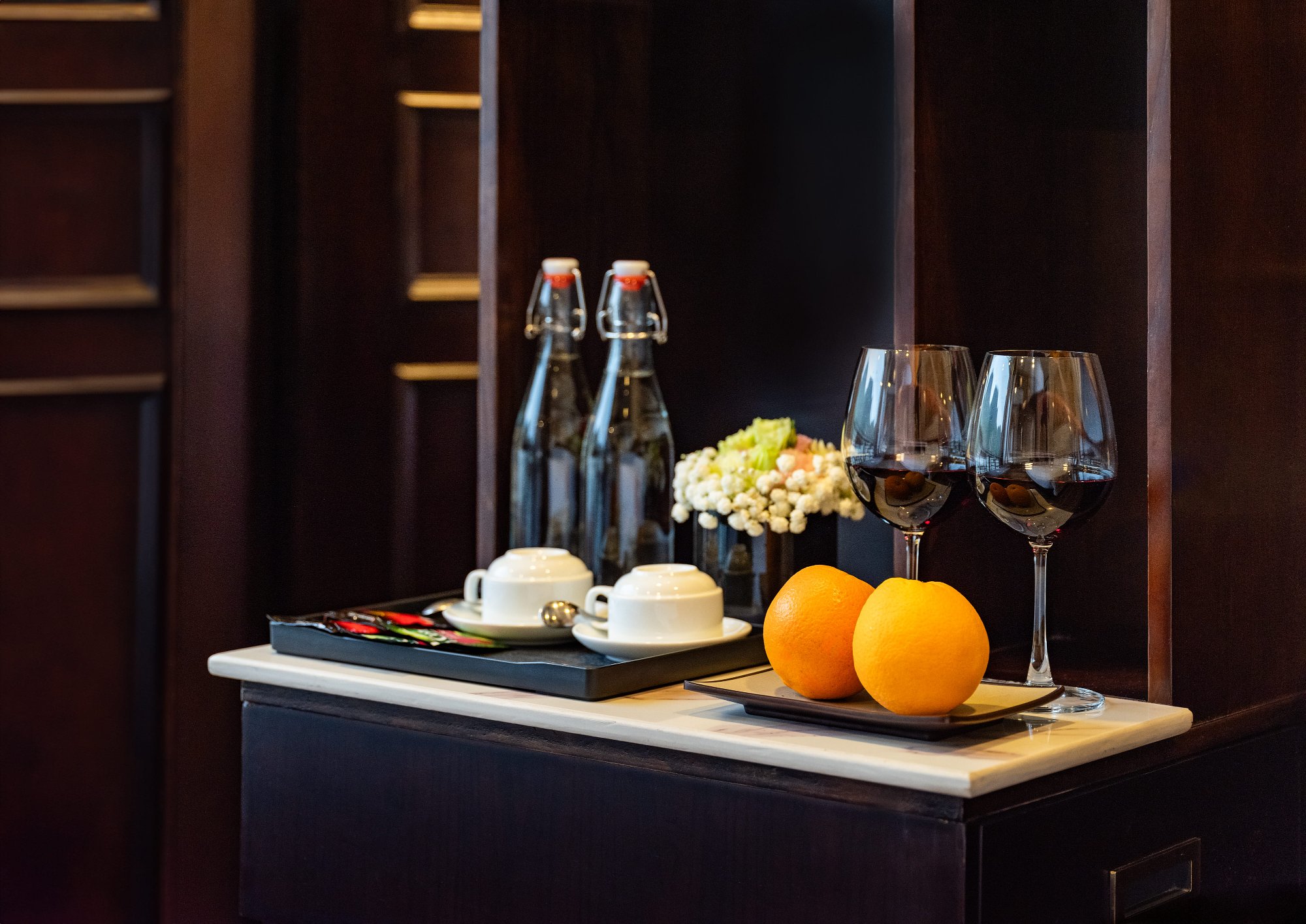 Tray of drinks and fruit prepared in the cabin