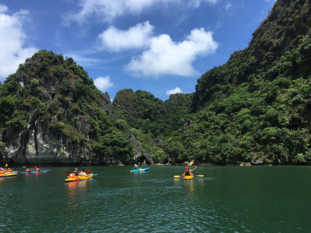 Tourists kayaking on Ha Long Bay