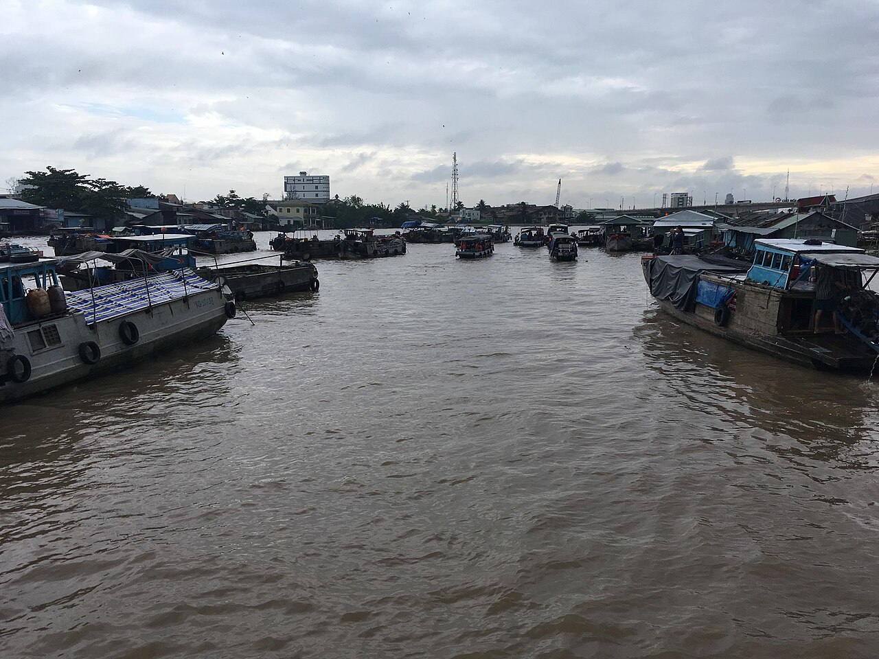 Cargo boats on the river at Cai Rang Floating Market