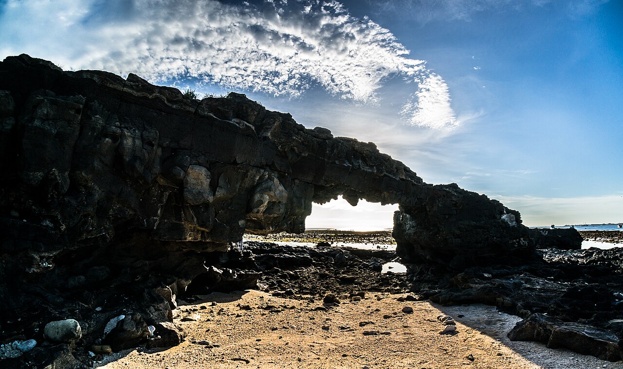 To Vo natural stone arch on the coast of Ly Son